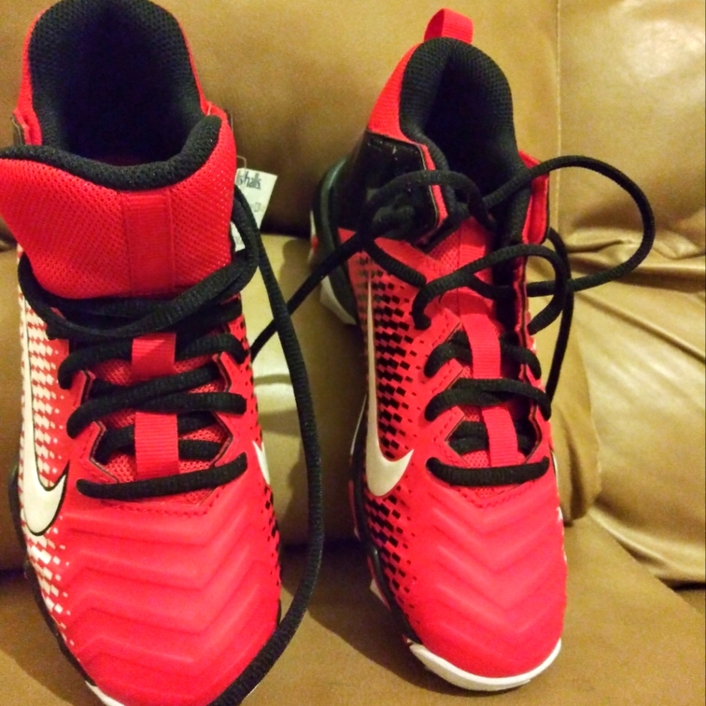 Boys NIKE Alpha cleats.